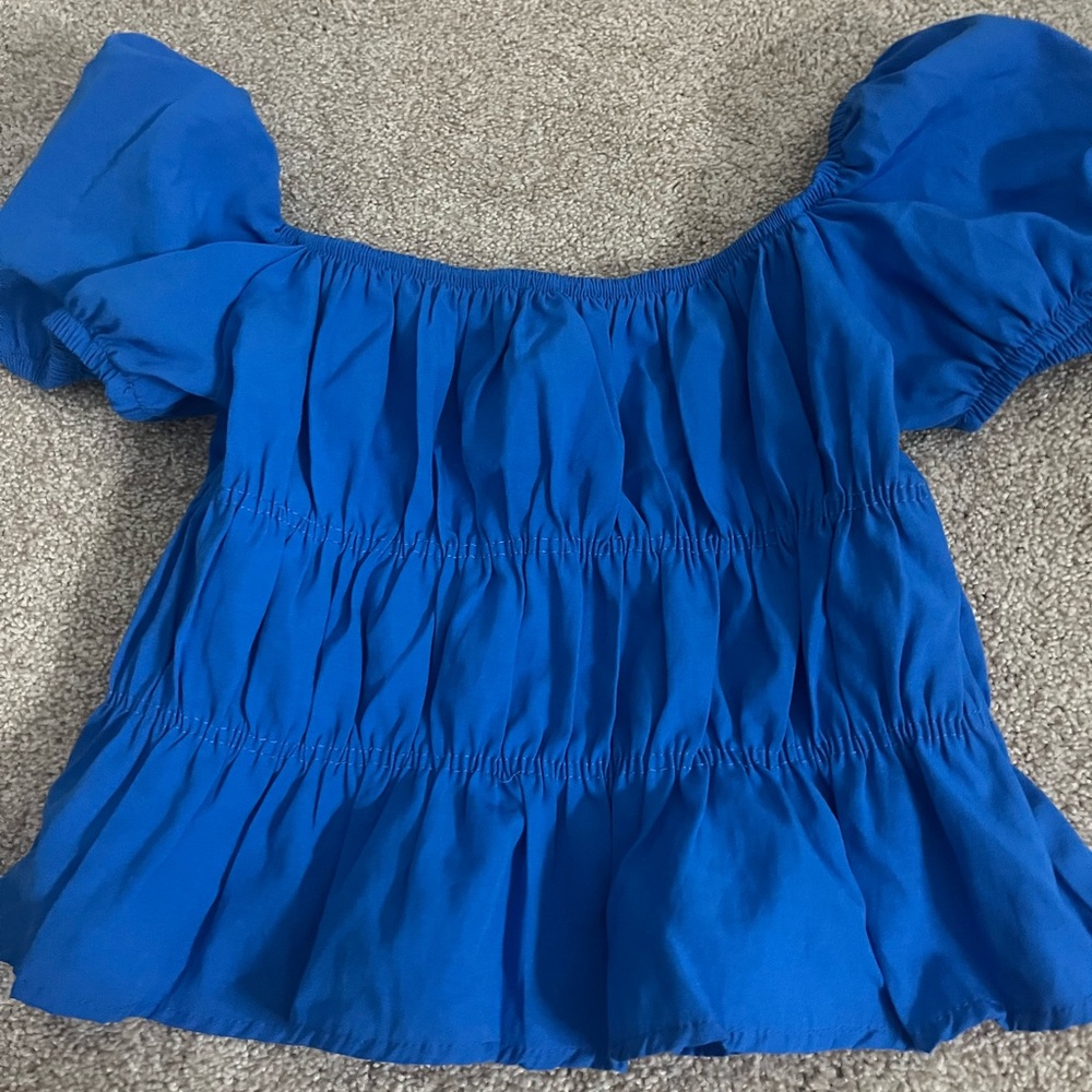 Blue ruffle top